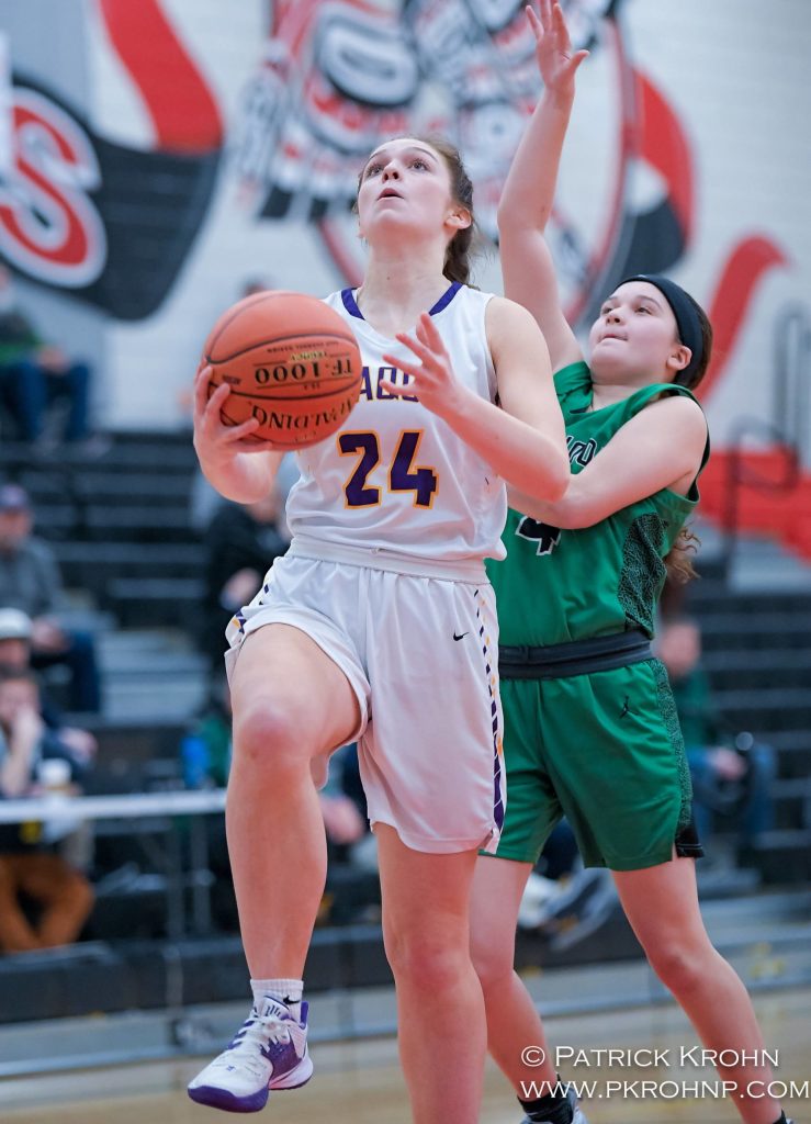 Issaquahs Alivia Stephens scored a game-high 17 points for Eagles during their regional playoff game against Kentwood on Feb. 29 at Sammamish High School. Photo courtesy of Patrick Krohn/Patrick Krohn Photography