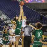 Issaquah forward Alivia Stephens (right) jumps for the opening tipoff during a 4A state basketball tournament game against Todd Beamer on March 7. Photo courtesy of Don Borin/Stop Action Photography