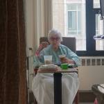 Geneva Woods, a former resident of Life Care Center of Kirkland, enjoys homemade potato soup while staying at Harborview Medical Center, which she requests from her family daily. Photo courtesy of Kate Neidigh