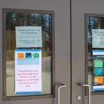 A sign on the door at Sunny Hills Elementary informs visitors that the school is closed for deep cleaning. Benjamin Olson/staff photo