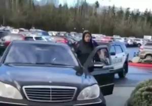 A screenshot of the video circulating on twitter showing a Bellevue Police Officer restraining a woman and forcing her to the ground. The video is now identified as an incident from Dec. 23, 2018.