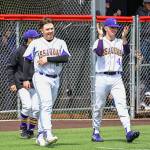 Joey Wilner (#11) and Dominic Guistino (#4) walk onto the field with smiles on May 7. Courtesy of Patrick Krohn.