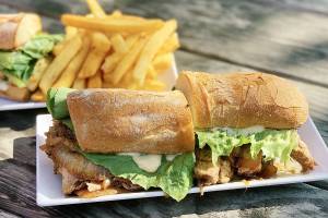 Caribbean Roast Sandwich and Tofu Delight Sandwich and Caribbean Fries. Courtesy of Hannah Watson.