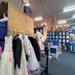 When partner agencies pick up the bundles, they can stop and shop at this rack with formal clothing if they know a child is going to an event. (Photo by Cameron Sires)