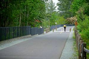 Another completed segment on the East Lake Sammamish Trail. The trail provides a 12-foot pavement path with a two-foot gravel shoulder on each side. (Photo courtesy of King County Parks)