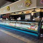 Fischer Meats fills its cases with fresh and local meats. (Photo by Cameron Sires)