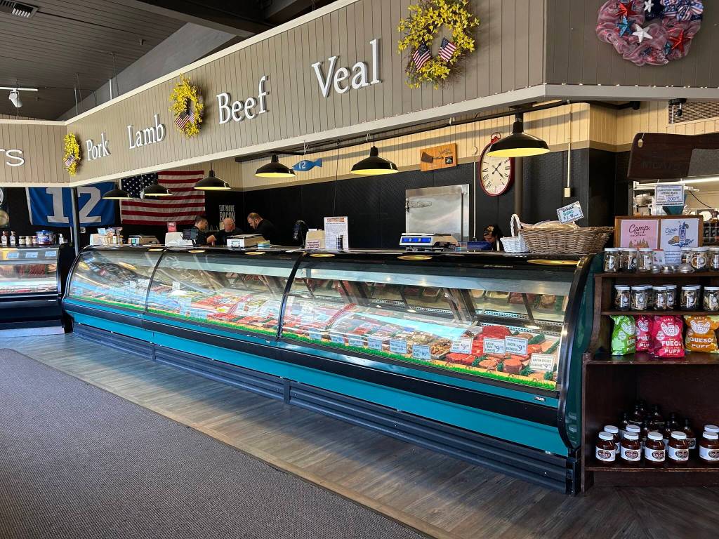 Fischer Meats fills its cases with fresh and local meats. (Photo by Cameron Sires)