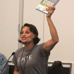 Writer Olivia Cuartero-Briggs holds up Gender Queer: A Memoir by Maia Kobabe, the most banned book in the United States, during an ECCC 2024 panel about banned books. Photo by Bailey Jo Josie/Sound Publishing