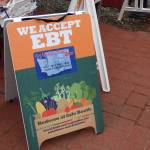 In the information booth at the front of the farmers market, people can redeem SNAP and EBT benefits for Market Bucks. All vendors accepting Market Bucks will have a sign that says, Issaquah Market Bucks accepted here. (Cameron Sires/ Sound Publishing)