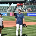 Kade Anderson and his brother Carter during Mariners batting practice. Photo by Ben Ray / Sound Publishing