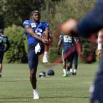 Jalen Milroe stretches during the team warm up at training camp. Photo provided by Maria Dorsten.