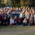 Issaquah community members gather around a trailhead marker named after late Sen. Bill Ramos at its unveiling, Oct. 6, 2025. Photo courtesy of the city of Issaquah