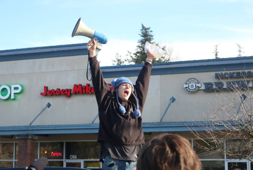 <p>Alex Nemirovsky, a Liberty High School senior, speaks passionately to the crowd. Photo by Bailey Jo Josie/Sound Publishing</p>