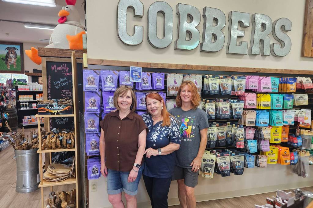 Cobbers Pet Pantry employees Jeanne Roske, Vicki Dodge, and owner Tamie Waugh. Photo by Ray Miller-Still